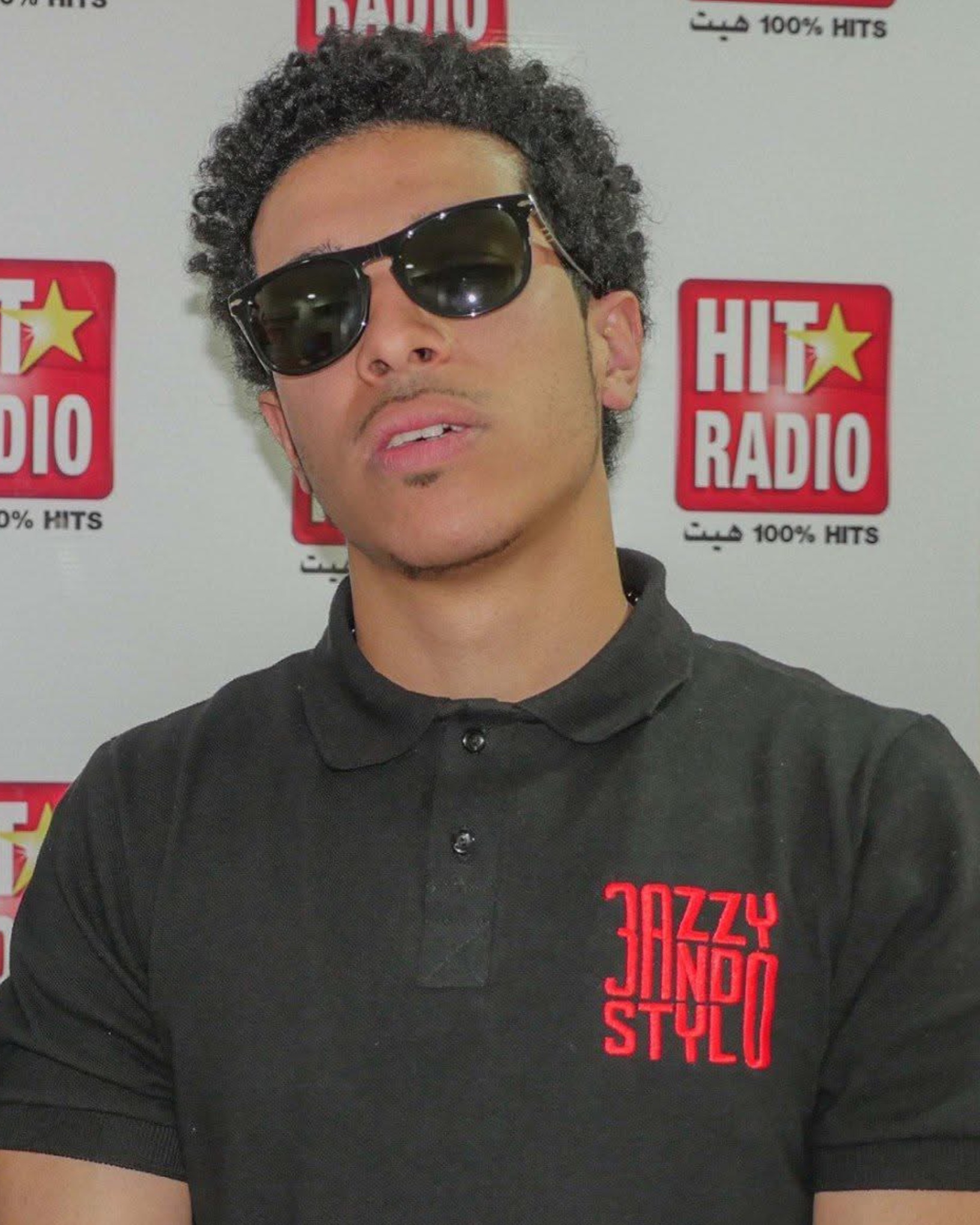 Album Rating: 3azzy 3ando Stylo Review | DimaTOP Magazine DROS at Hit Radio, promoting 33S during its release. (2014)