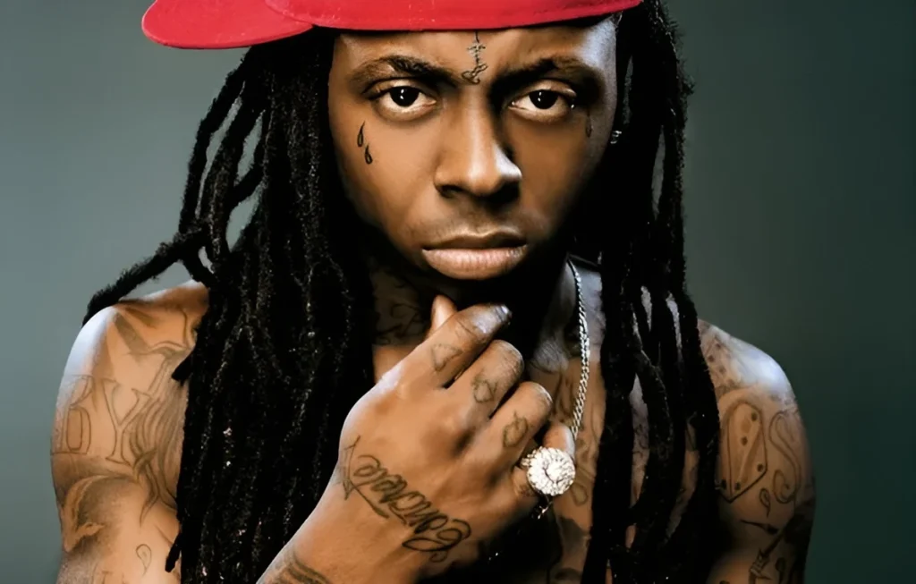 7liwa: Morocco’s Lil Wayne | 7 Parallels Between 2 Hip-Hop Icons American Rapper Lil Wayne iconic photo with face tattoos and red snapback