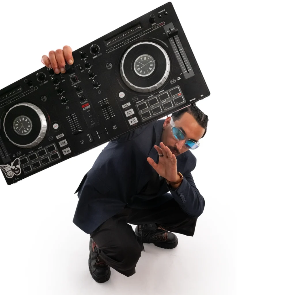 Moroccan hip-hop figure and MC Lembowe9 with a speaker