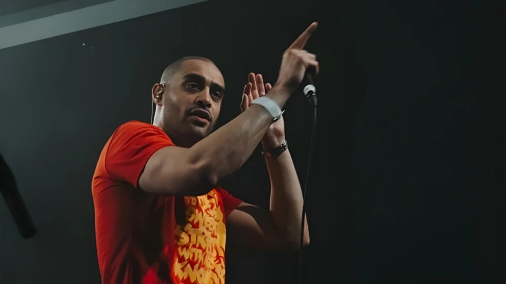 British Iraqi Rapper and Activist Lowkey On Stage