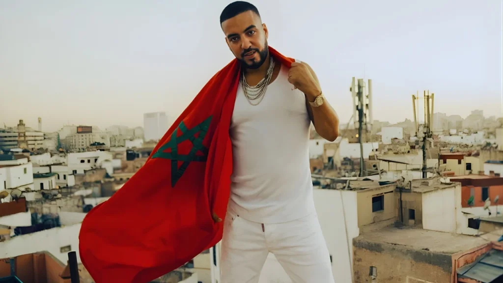 Moroccan-American rapper French Montana drapes the Moroccan flag around himself
